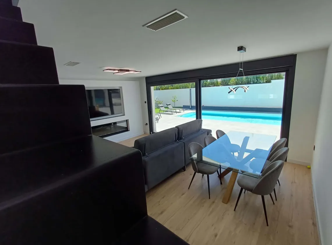 Salón del proyecto Noguera, realizado por CLP Design